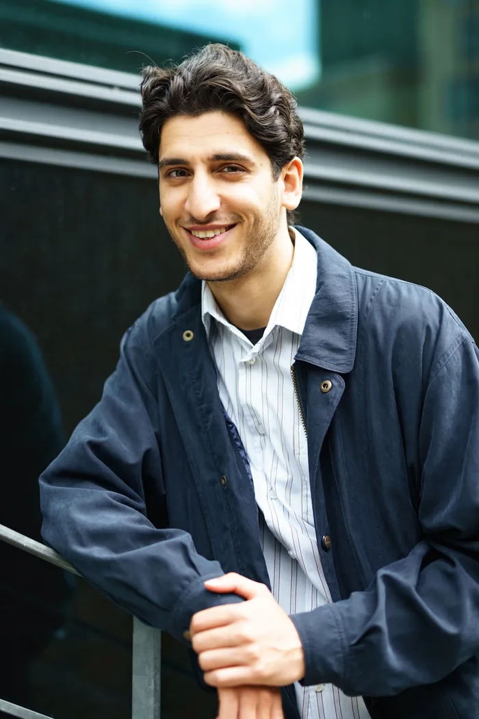 Man in a modern jacket before the 1950s decade filter